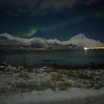 Midnight-sun And Northern-lights House By Ocean Vestvagoy