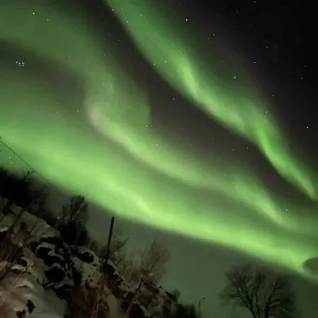 Midnight-sun And Northern-lights House By Ocean
