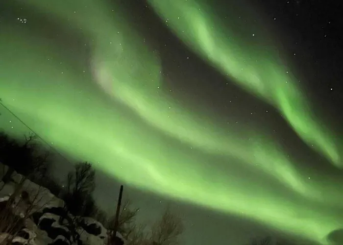 Midnight-sun And Northern-lights House By Ocean