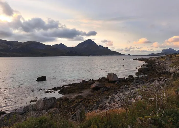 Midnight-sun And Northern-lights House By Ocean Vestvagoy