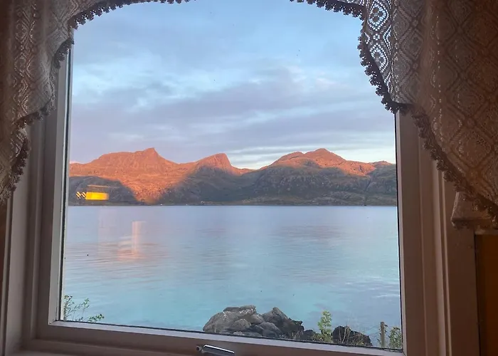 Midnight-sun And Northern-lights House By Ocean *